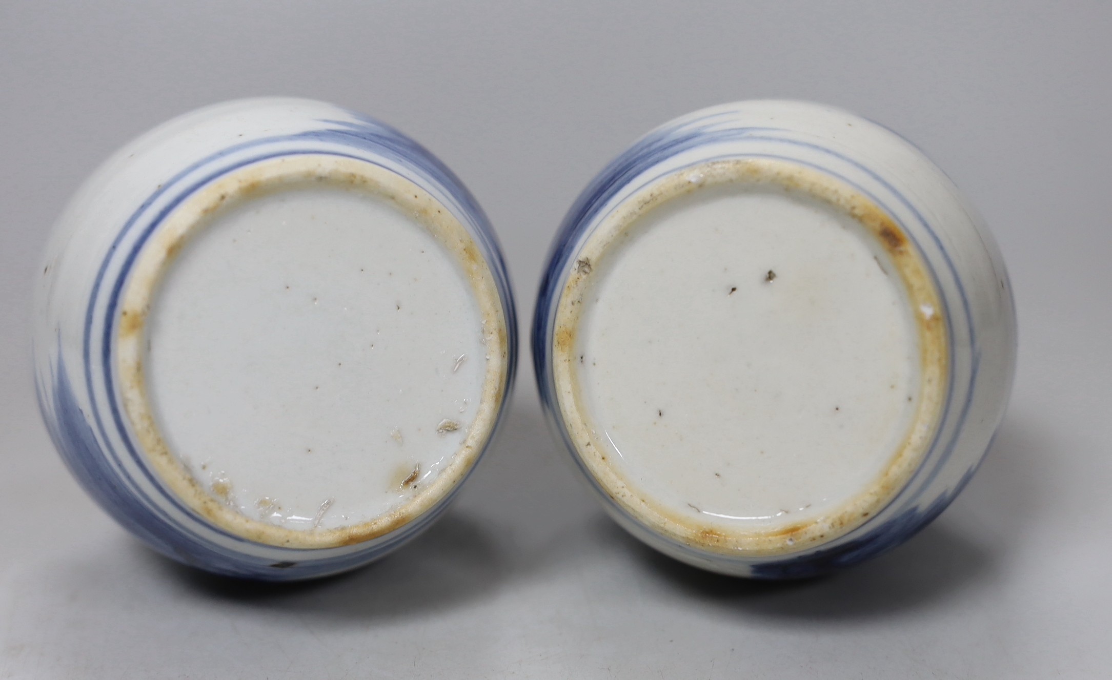 A pair of 19th century Chinese blue and white bottle vases, 16cm